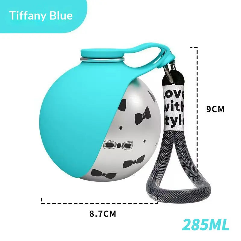 2 in 1 pet travel water bottle in Tiffany Blue with fold-out drinking bowl and strap for easy carrying.