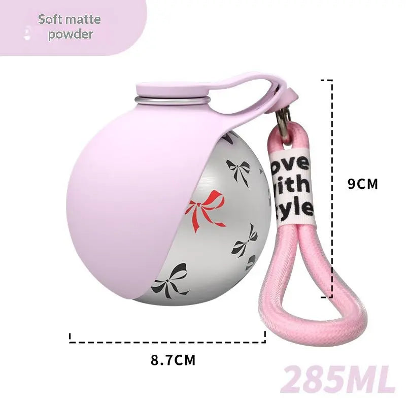 2 in 1 pet travel water bottle in soft matte pink with a built-in bowl and pink clip for easy transport.